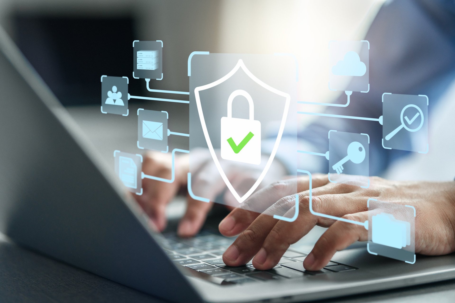 Man using computer with security system